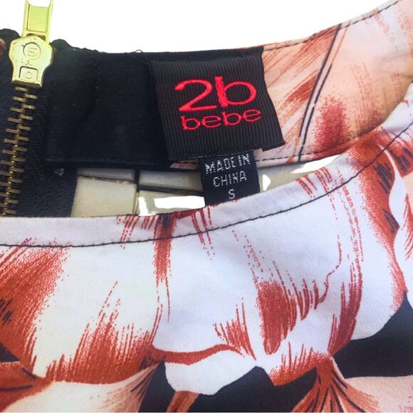 Bebe Peplum Top Blouse Small Dark Floral Cutout Black Pink Wine Short Sleeves - Picture 4 of 11